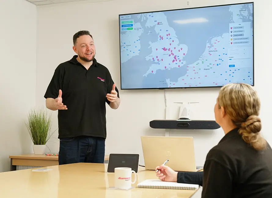 A presentation takes place in the Diamond Logistics office
